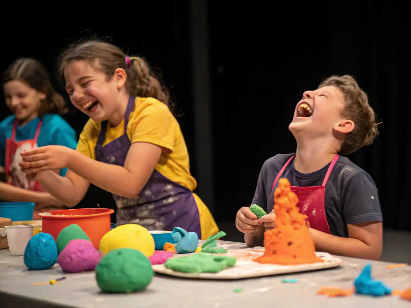 An image of children participating in a pottery class at MJC, showcasing their creativity and engagement with the instructor.